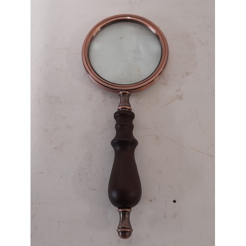 65 - Desk top Looking Glass with copper detail and wooden handle, 22cm long x 9cm diameter