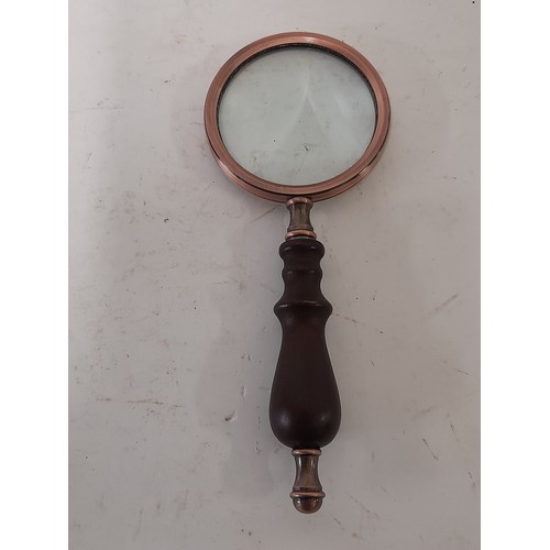 65 - Desk top Looking Glass with copper detail and wooden handle, 22cm long x 9cm diameter