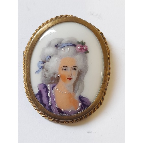 71 - Vintage Limoges Porcelain Hand Painted Brooch of a Lady with Blue bow in her hair, 5cm x 4cm