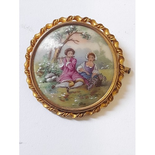 72 - Vintage Limoges Porcelain Hand Painted Brooch of a man playing a Flute to a Woman, 5cm diameter