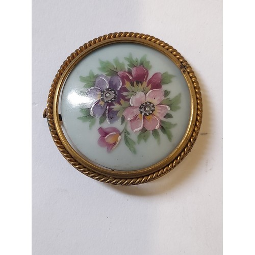 74 - Vintage Limoges Porcelain Hand Painted Brooch of a still life of Flowers, 5cm diameter (loose in mou... 