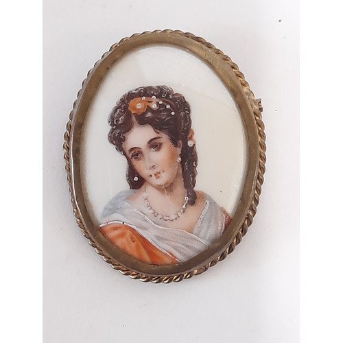 77 - Vintage Limoges Porcelain Hand Painted Brooch of a young lady with Red Bow in Hair, 5cm x 4cm