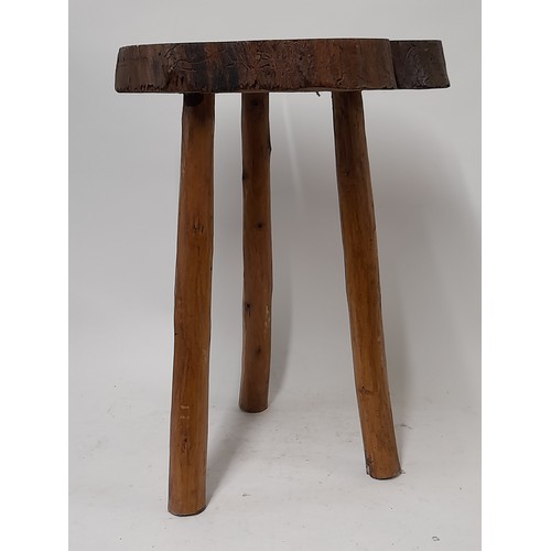 82 - Folk Art style 3 Legged Stool with Whittled Legs And a Cross section cut trunk Seat, 45cm high x 32c... 