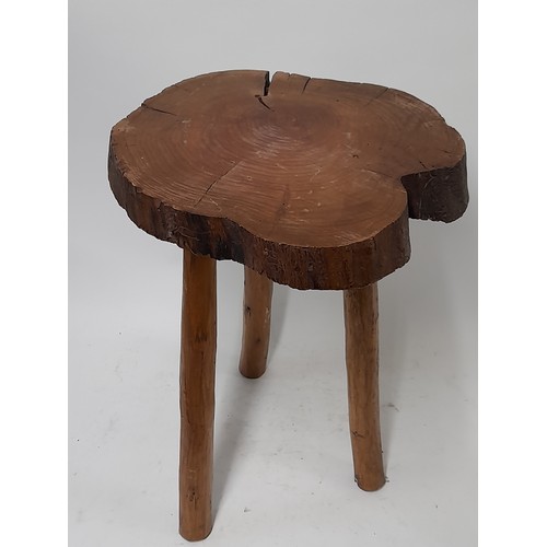 82 - Folk Art style 3 Legged Stool with Whittled Legs And a Cross section cut trunk Seat, 45cm high x 32c... 