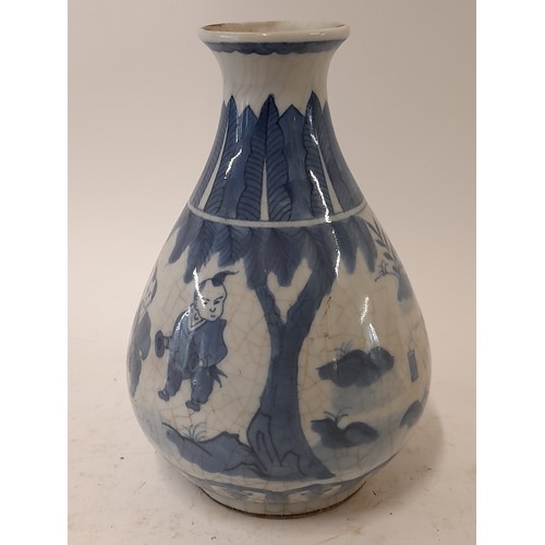 89 - Blue and White Chinese Vase with crackle glaze finish depicting children in various activities, 20.5... 