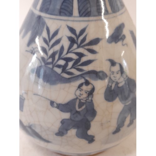 89 - Blue and White Chinese Vase with crackle glaze finish depicting children in various activities, 20.5... 