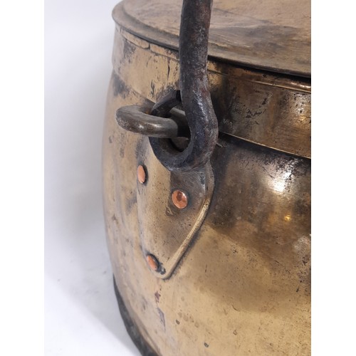 97 - Very Large Brass Flat bottom Cooking Vessel with Lid and Iron swing Handle, 37cm high x 44cm diamete... 