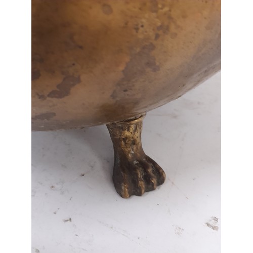 99 - Brass French Pot with swing handle standing on 3 Paw Feet and having Bird adornments to the side, 29... 