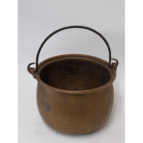 102 - Small Brass Cooking Vessel with Iron Swing Handel, 20cm high x 29cm wide