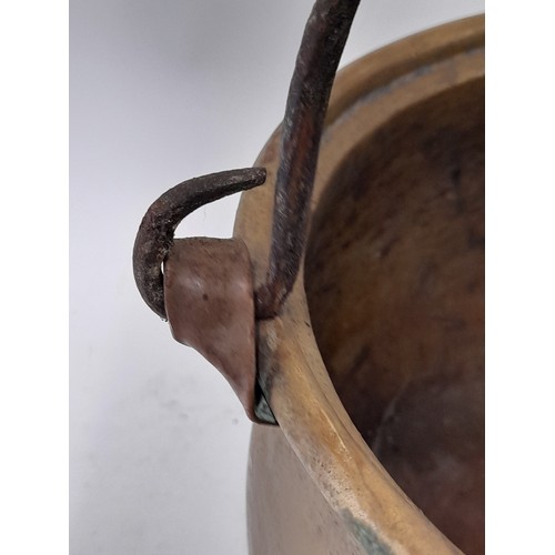 102 - Small Brass Cooking Vessel with Iron Swing Handel, 20cm high x 29cm wide