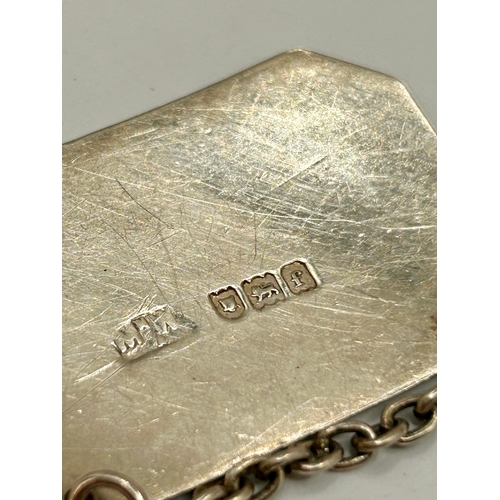 128 - Three Silver Hallmarked Bottle Tags. 19grams.  (3)