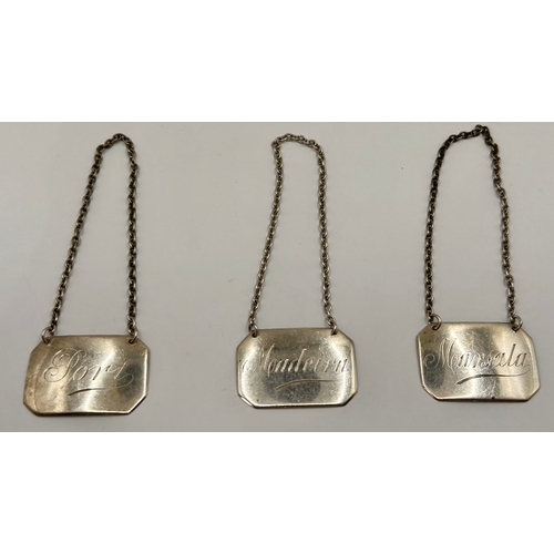 128 - Three Silver Hallmarked Bottle Tags. 19grams.  (3)