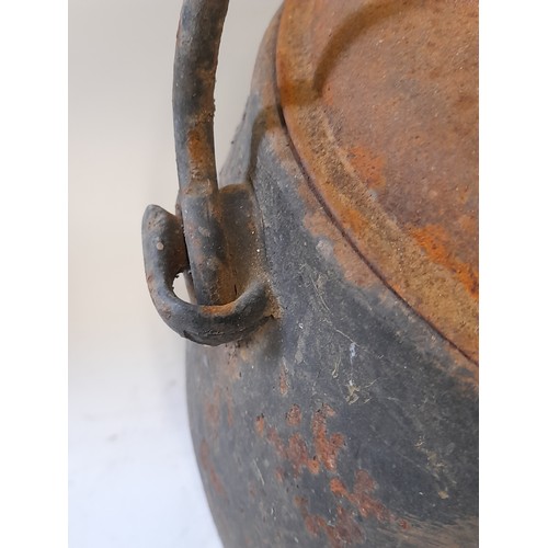 112 - Large Cast Iron Cooking Pot (4 Gallon)with lid and swing handle marked CWS DUDLEY, 41cm x 23cm