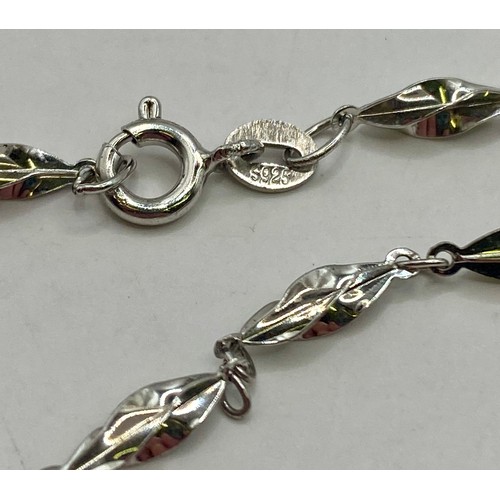 32 - Three Sterling Silver Bracelets to Include Pendant and Chain Examples. Weight 0.334 Oz