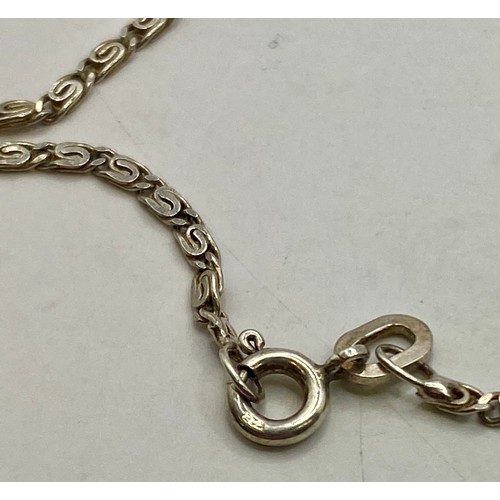 32 - Three Sterling Silver Bracelets to Include Pendant and Chain Examples. Weight 0.334 Oz