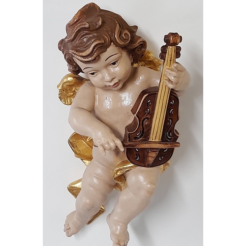 38 - Composite Winged Cherub Figure, 24cm high