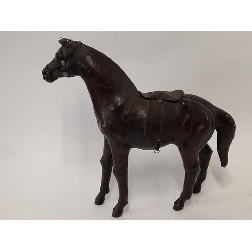 134 - Leather Clad Horse, 34cm long x 32cm high