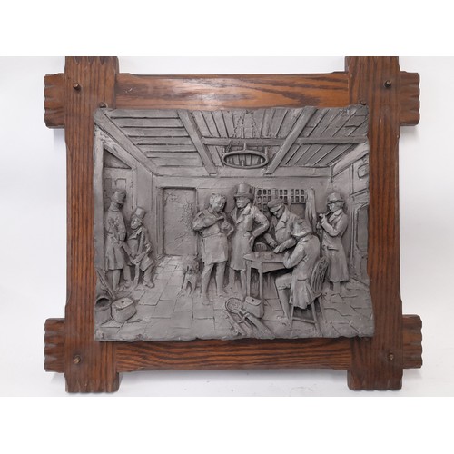 282 - Plaster Relief Moulding of a Pub Scene mounted on a wooden Frame, 58cm x 53cm