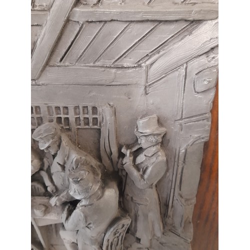 282 - Plaster Relief Moulding of a Pub Scene mounted on a wooden Frame, 58cm x 53cm