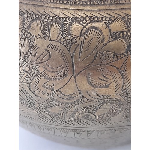 143 - Heavy Brass Pot, possibly Indian, 13cm high x 13cm wide with chased panels to circumference