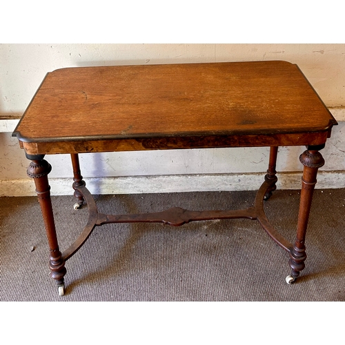 69 - Antique Occasional Table On Casters. 103cm x 53cm x 73cm.