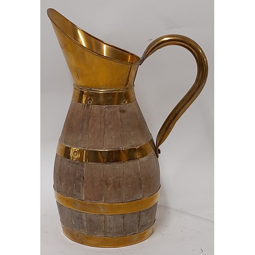 34 - Brass and wood coopered Barrel Jug, 24cm high