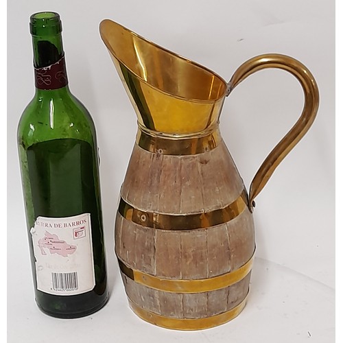 34 - Brass and wood coopered Barrel Jug, 24cm high