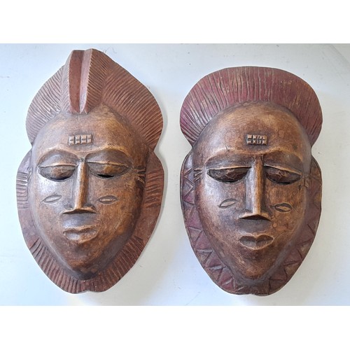 39 - Pair Of Vintage Carved Wood Tribal Face Masks for wall mounting, 26cm high