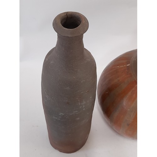 42 - 3 x Continental wood fired clay bottles, tallest 28cm high