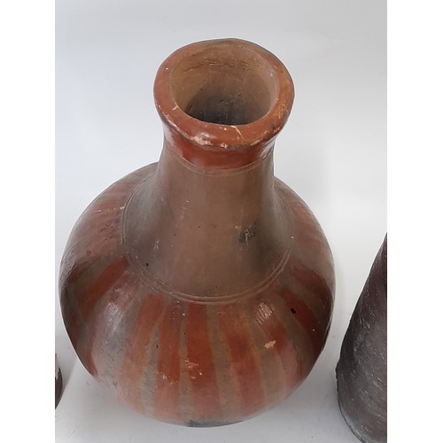 42 - 3 x Continental wood fired clay bottles, tallest 28cm high