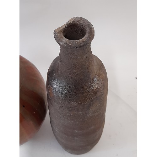 42 - 3 x Continental wood fired clay bottles, tallest 28cm high