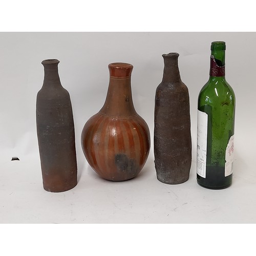 42 - 3 x Continental wood fired clay bottles, tallest 28cm high