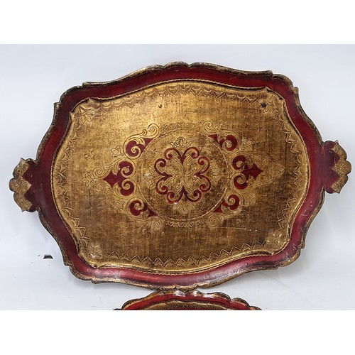 16 - 2 x Florentine Trays, one round, 35cm diameter and a 2 handled Tray, 67cm x 45cm