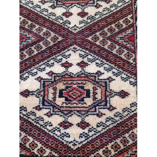 17 - Decorative Red Ground Rug, 89cm x 61cm