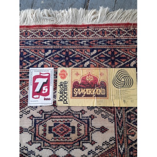 17 - Decorative Red Ground Rug, 89cm x 61cm