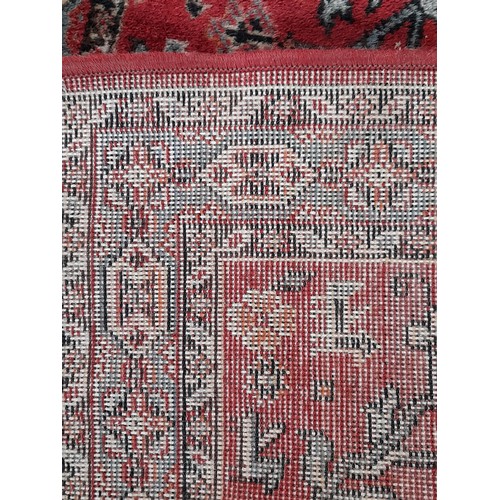 18 - Decorative  Red Ground Rug,  87cm x 64cm