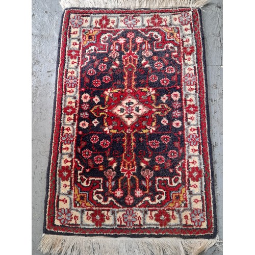 23 - Decorative Red Ground Rug,  60cm x 40cm