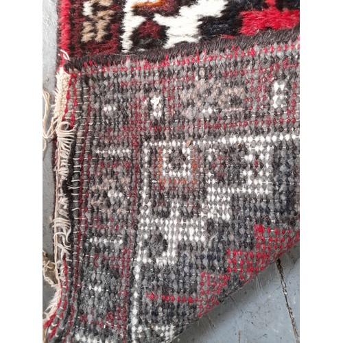 24 - Decorative Red Ground Rug,  70cm x 52cm