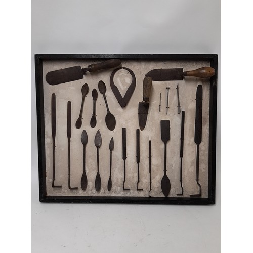 25 - Display Board of Vintage tools possibly for use in cast Iron Mouldings, 61cm x 51cm