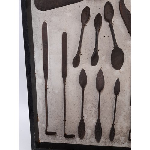 25 - Display Board of Vintage tools possibly for use in cast Iron Mouldings, 61cm x 51cm