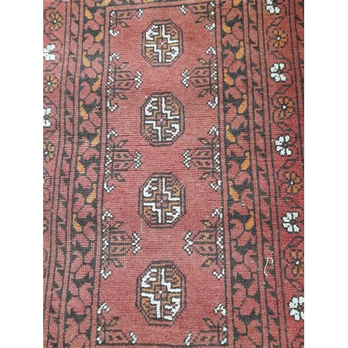 90 - Red ground rug 96cm x 53cm