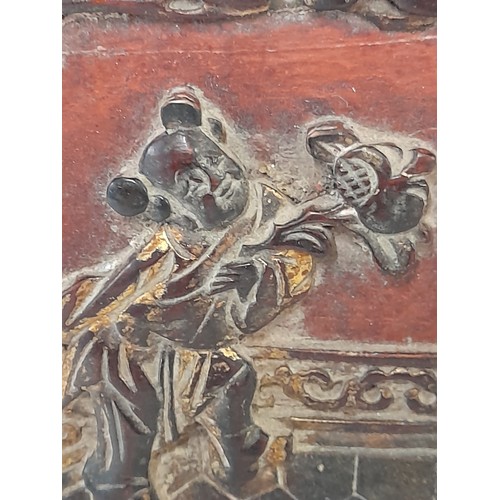 121 - Wood carved panel depicting an Oriental couple on a bridge, 33cm x 22cm