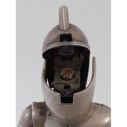 122 - Vintage Table Cigarette Lighter in the form of a Knight standing on a plinth, 17cm high