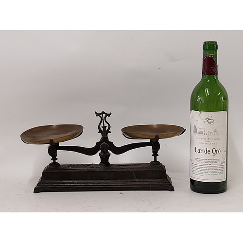 166 - Small Set of Scales with cast iron base and 2 Brass dishes, 34cm wide x 16cm high