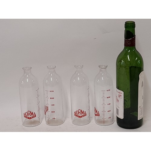 194 - 4 x NORMA Dur o Bor Glass bottle with measurement Scale, 17cm high