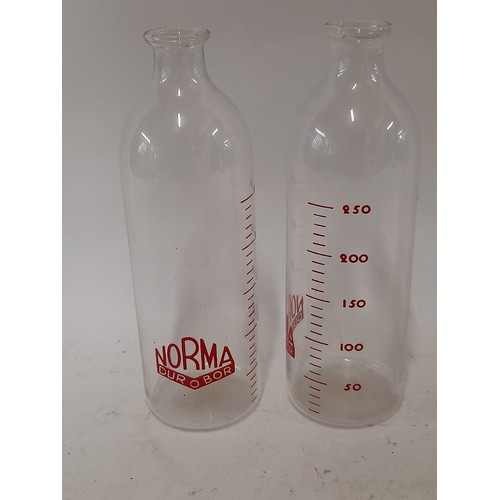 194 - 4 x NORMA Dur o Bor Glass bottle with measurement Scale, 17cm high