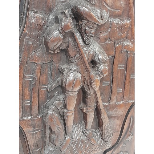 199 - Deep Carved wood Panel of a Huntsman and Dog, 37cm x 57cm