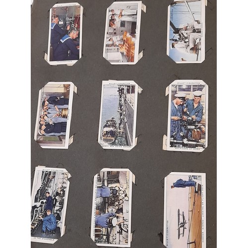 204 - Players Navy Cut Cigarette Card Album with a quantity of cards of different subjects