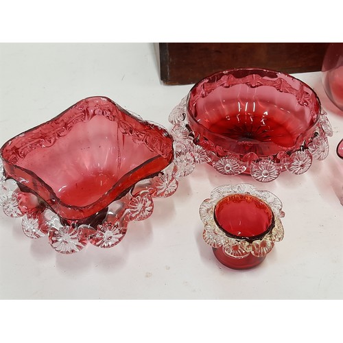 214 - 7 x items of Cranberry Glass (some with damage) contained in a wooden box, 34cm x 16cm x 17cm