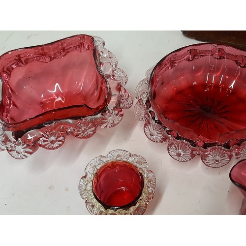 214 - 7 x items of Cranberry Glass (some with damage) contained in a wooden box, 34cm x 16cm x 17cm